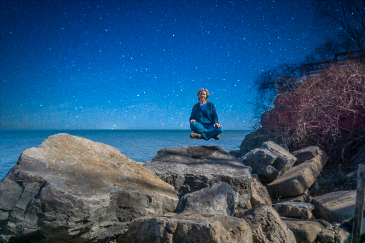 Composite photo of Susan on her shoreline against the backdrop of stars